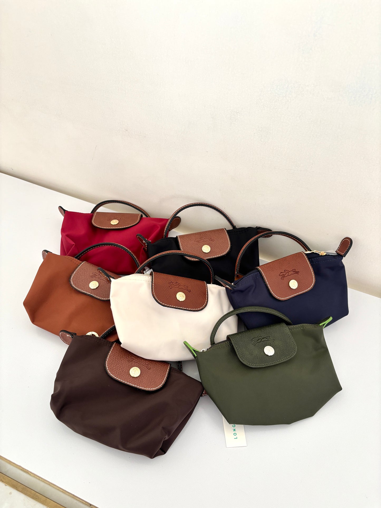 Iconic Pouch with handle.