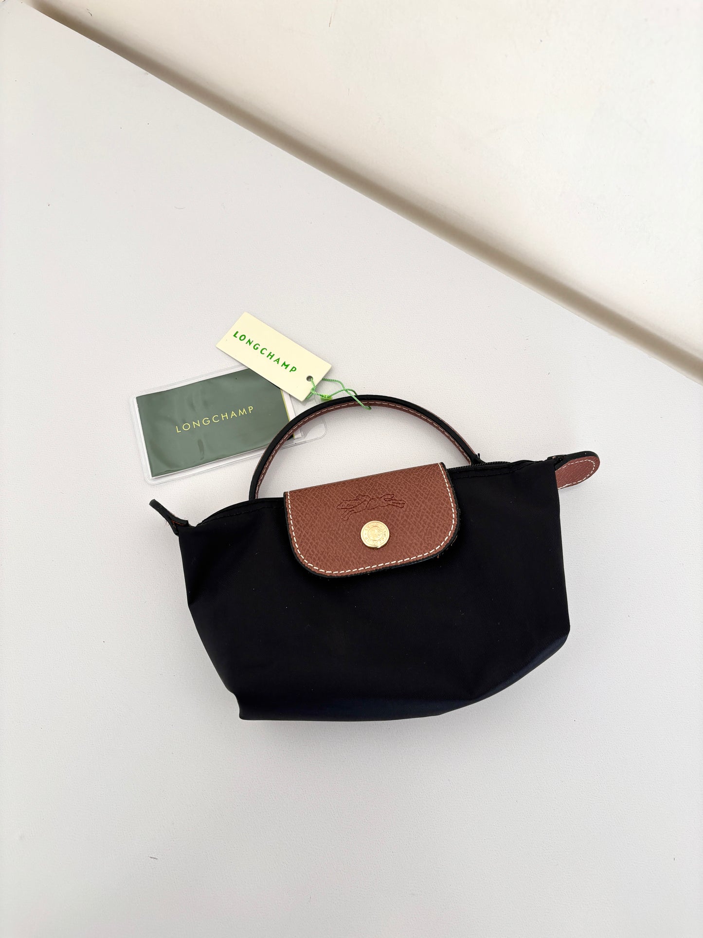 Iconic Pouch with handle.