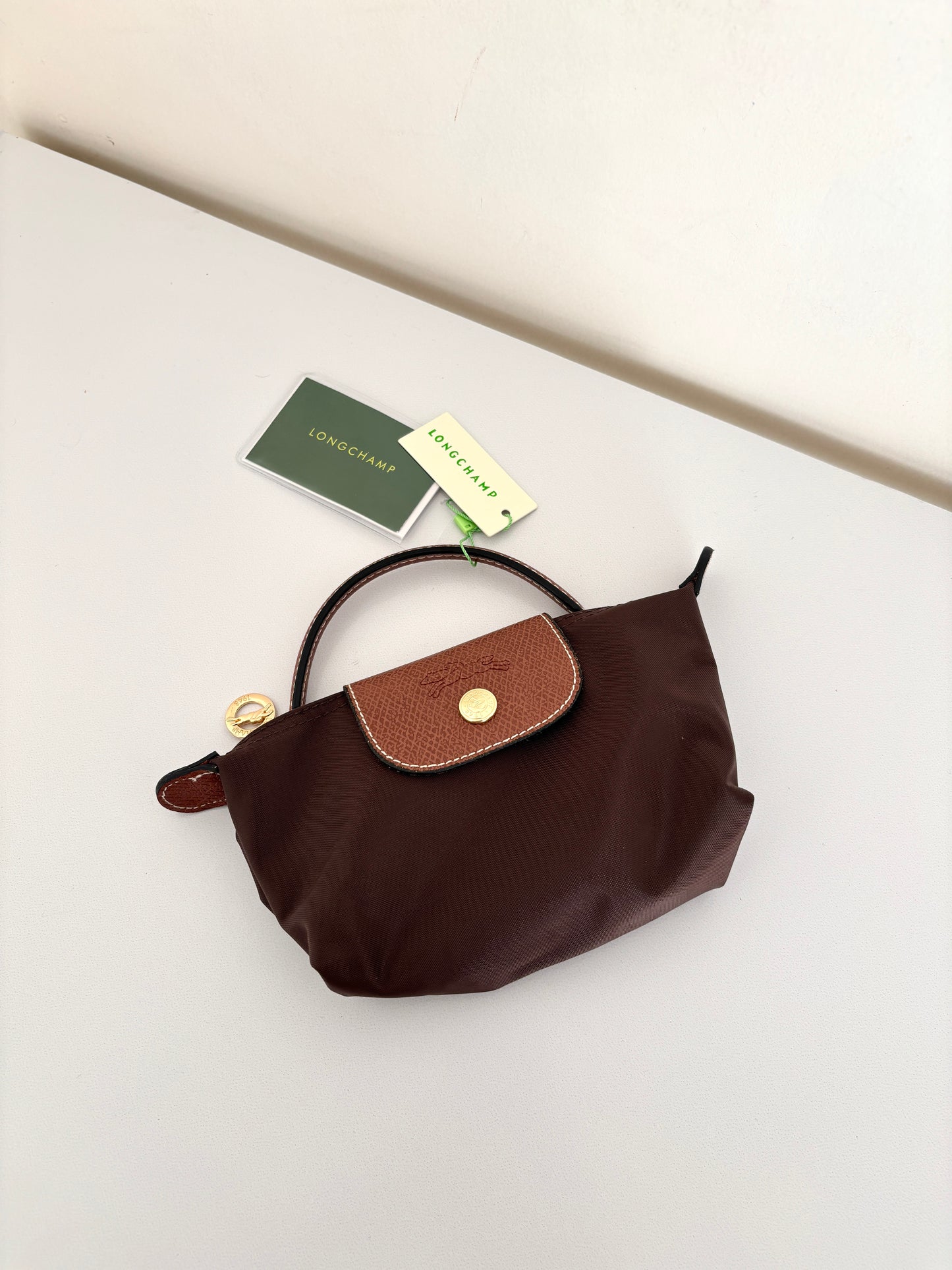 Iconic Pouch with handle.