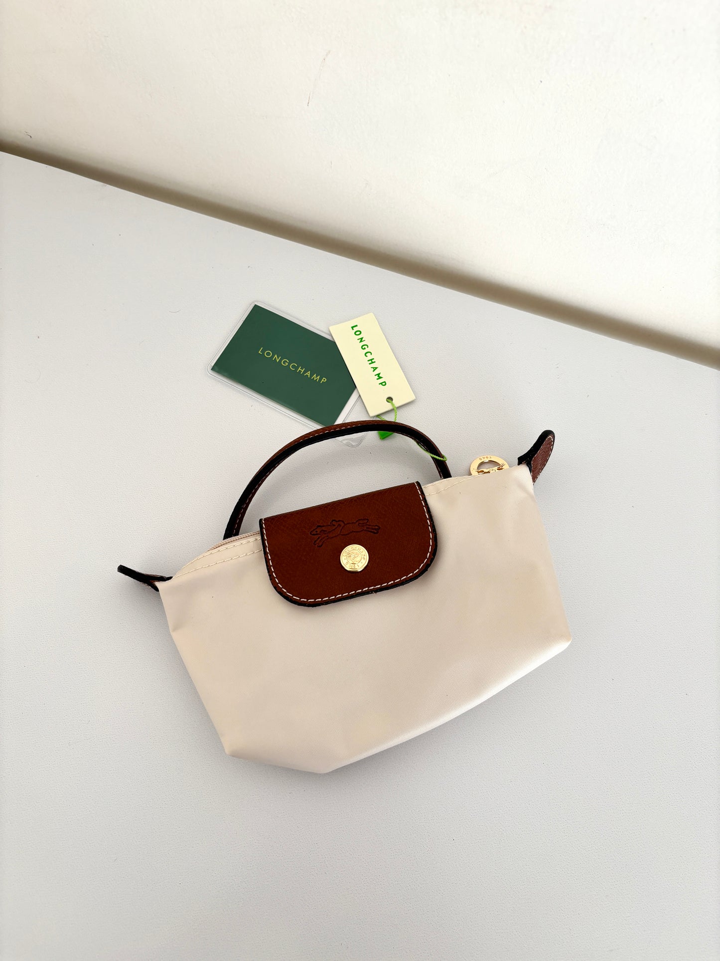 Iconic Pouch with handle.