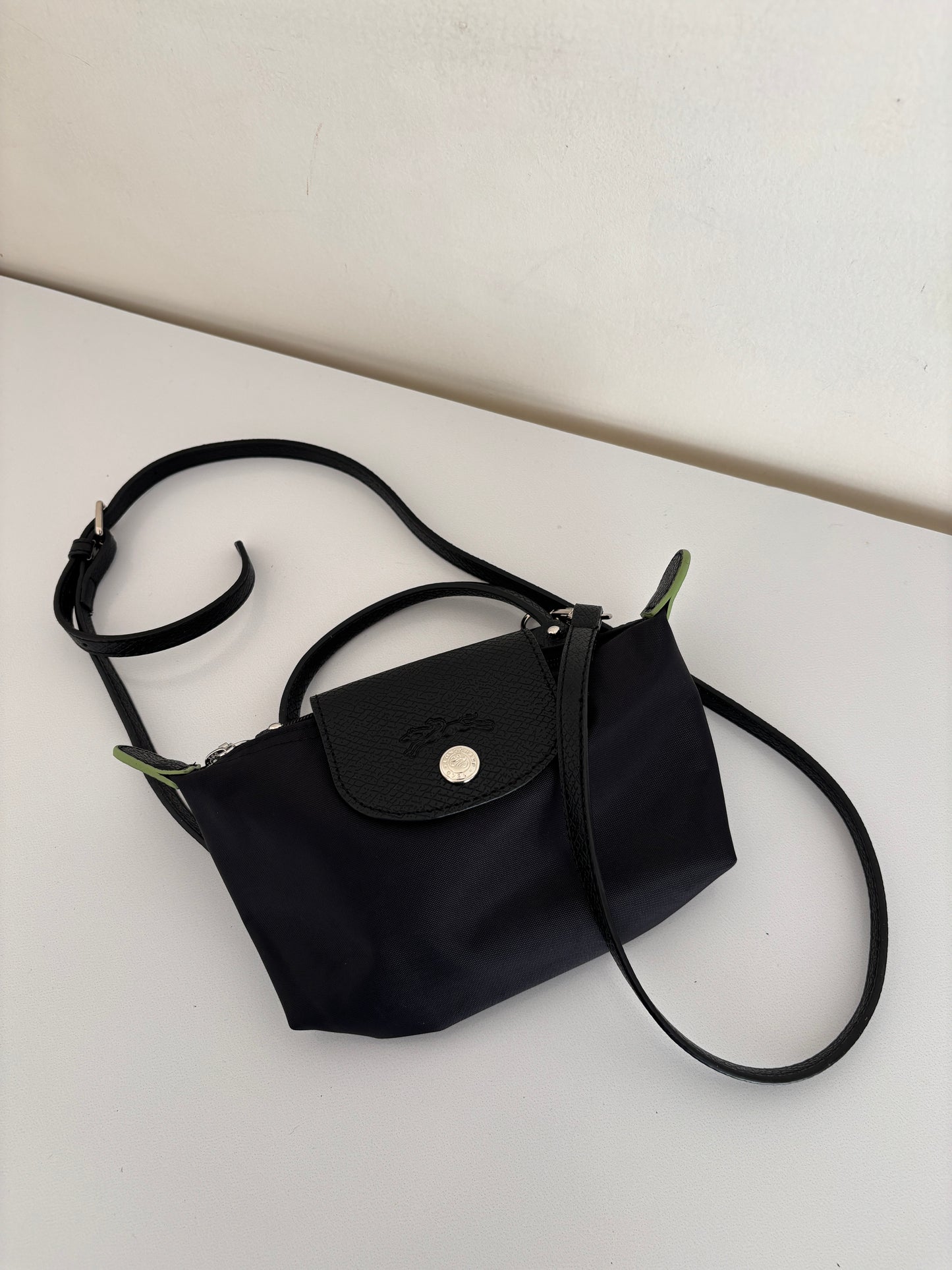 Iconic Pouch with handle.